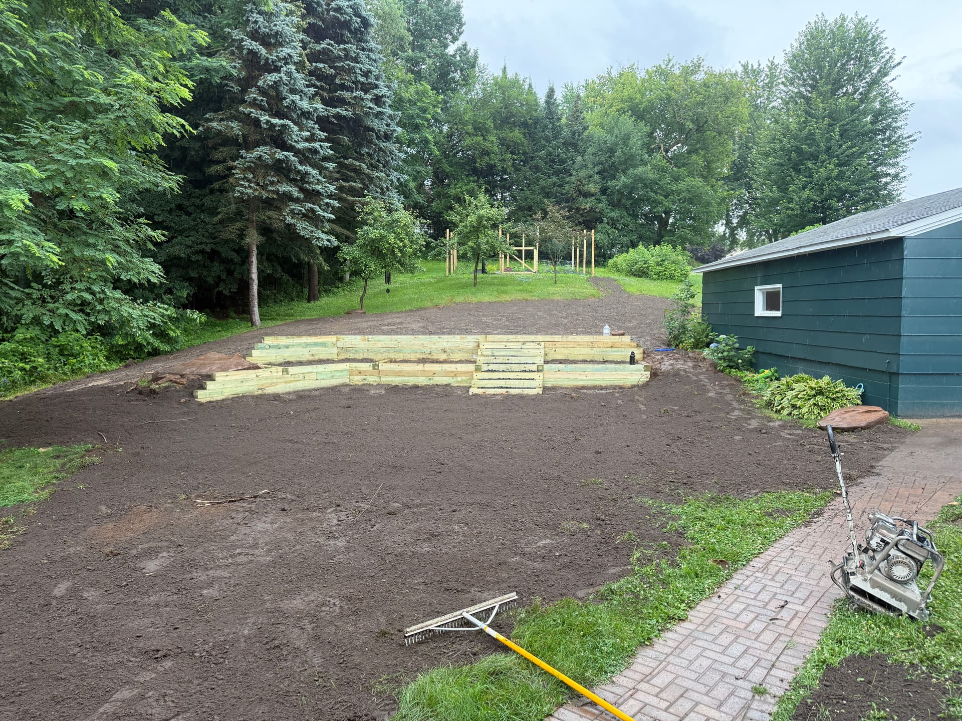 Retaining Wall Removal, Paver Walkway and Patio Build With Lighting image