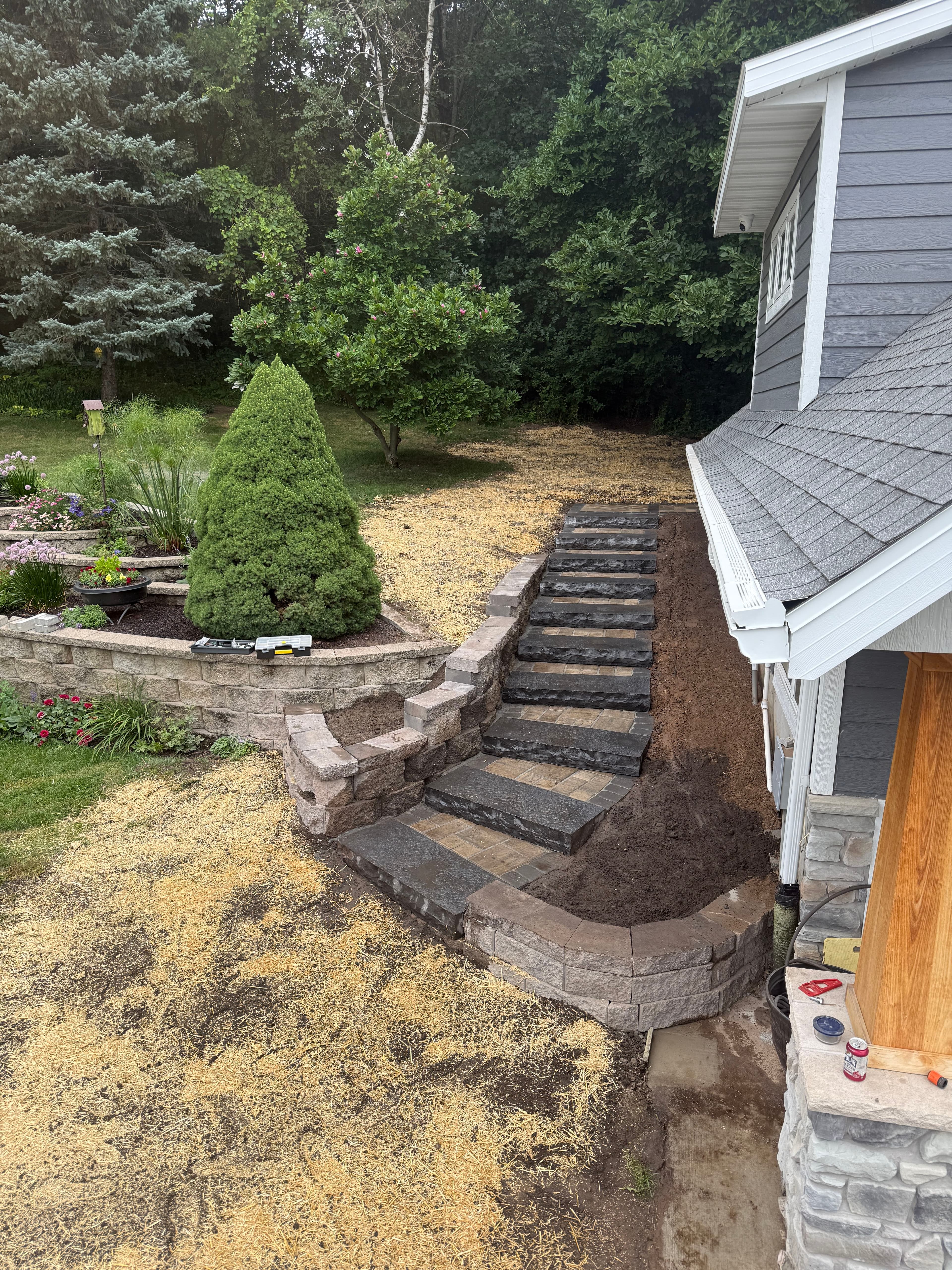 Project Sloped Entrance Gets a Full Step and Retaining Wall Rebuild image