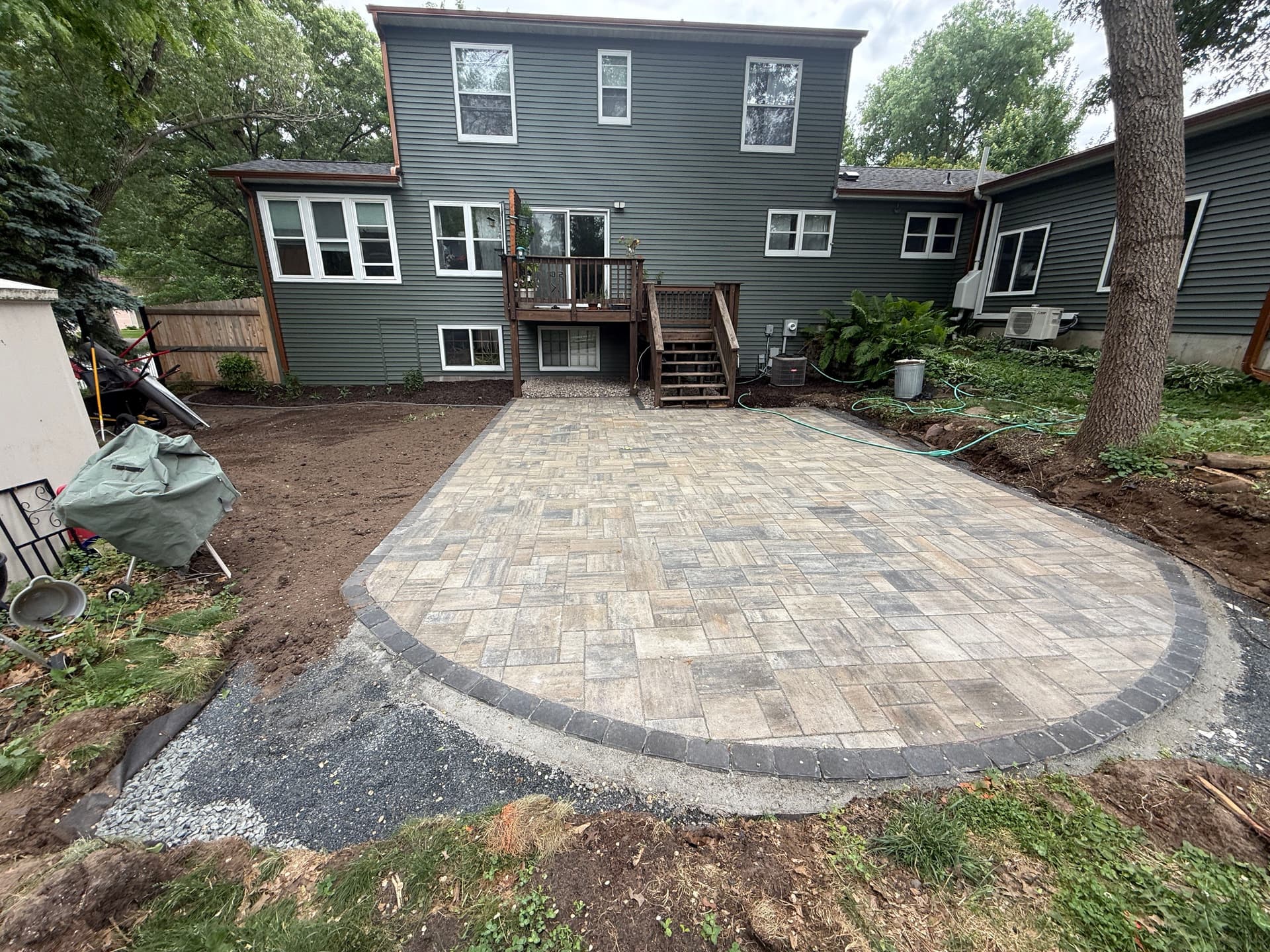 Backyard Paver Patio and Front Entry Steps Built for Real Life image